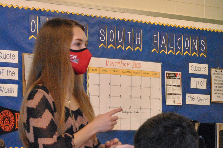 Teacher Hannah Greer wearing a mask while leading her class.