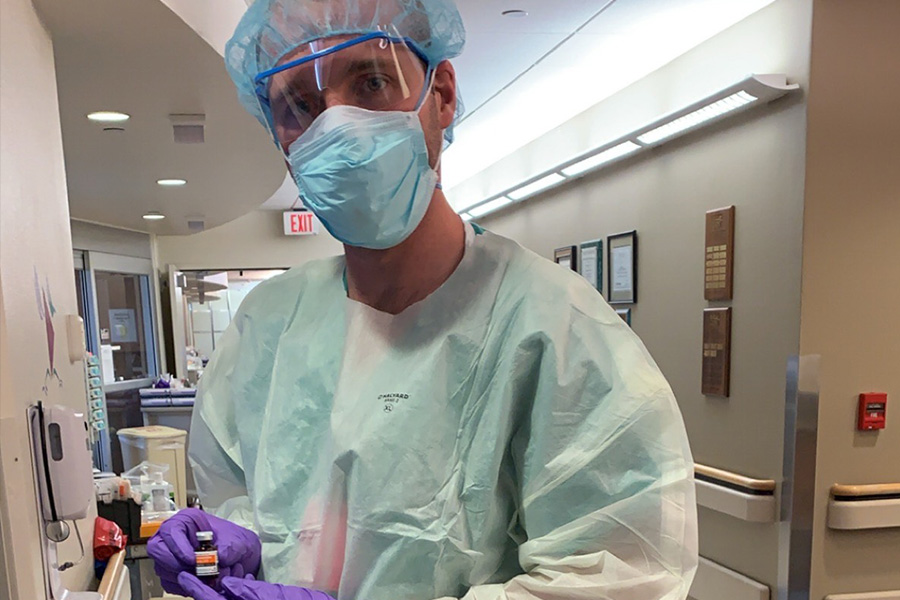 Dr. Lane Koch in full personal protective equipment, in a hospital
