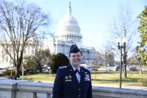 Gen. Aye in front of capitol