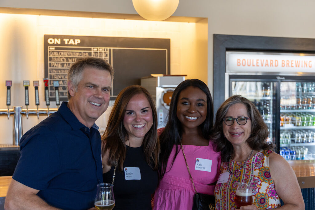 Baker alumni at a social